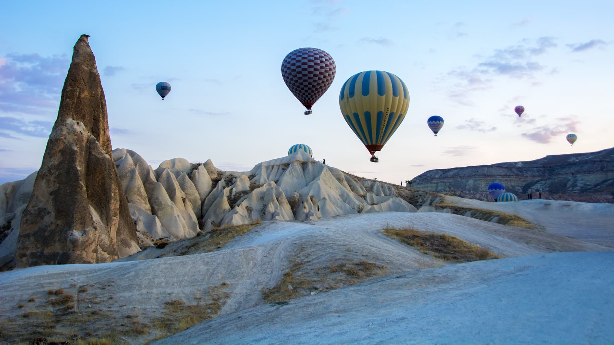 Hot air balloons over Cappadocia at sunrise